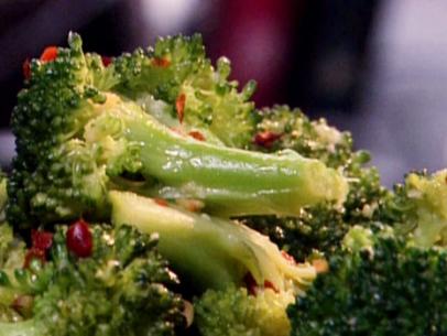 Spicy broccoli saute is small florets sauteed with minced garlic, red pepper flakes, salt, pepper, and olive oil.