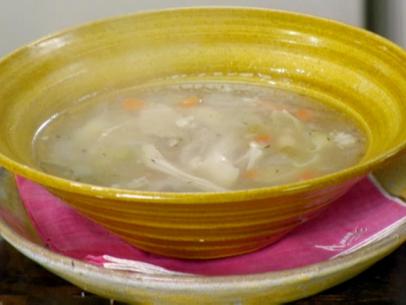 Chicken noodle soup with carrots and celery.