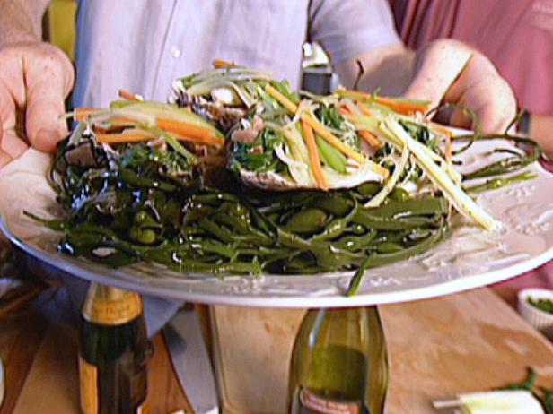 Poached Oysters in Champagne with a Julienne of Vegetables, Leaf Spinach and Prosciutto Ham image