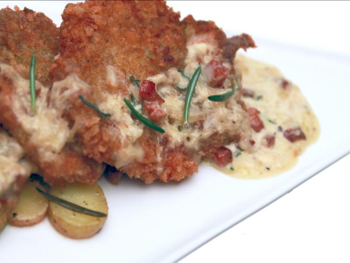Pan Fried Chicken Thighs with Pancetta Cream over Confit Potatoes