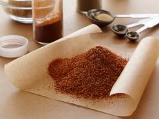 Blend a homemade Rib Dry Rub recipe from BBQ with Bobby Flay on Food Network to season your next rack of ribs with cumin, paprika, cayenne and chili powder.