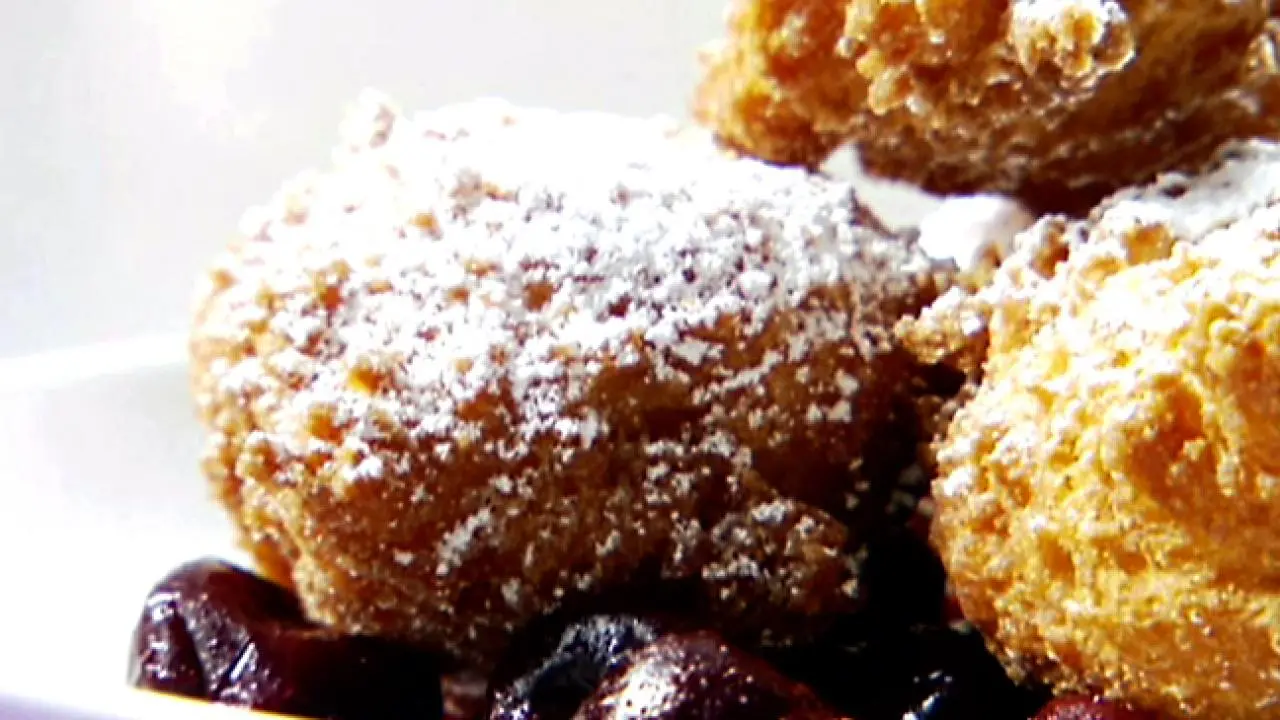 Italian Donuts in Cherry Sauce