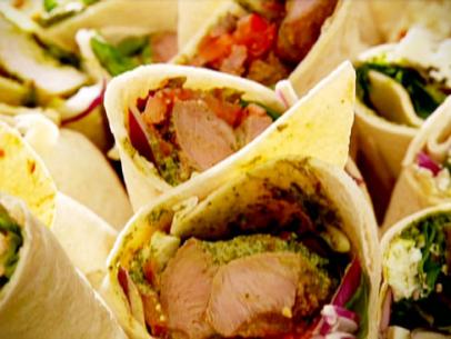 Tandoori lamb wraps are tortilla shells filled with lamb, Greek style yoghurt, herbs, and spices.