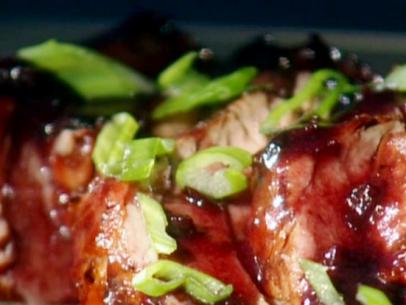Pork tenderloin is topped with a blackberry jalapeno glaze.