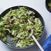 Cooking Channel 
Sunny Anderson Crunchy Sweet Brussels Sprout Salad
Thanksgiving Salad-Add Color & Greens to Your Table