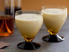 For a drink with holiday spirit, make a batch of Alton Brown's Eggnog from Good Eats on Food Network.
