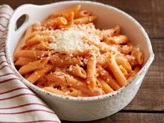 PENNE ALLA VODKA Ree Drummond The Pioneer Woman/Cowgirls and Cowboys Food Network Penne, Garlic, Onion, Butter, Olive Oil, Vodka, Tomato Puree, Tomato Sauce, Heavy Cream, Red Pepper Flakes, Parmesan