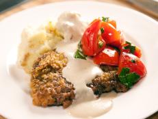 Ree Drummond - Host prepares mashed potatoes, chicken fried steak and marinated tomato salad during episode 1 as seen on Food Network's Pioneer Woman Season 1. 