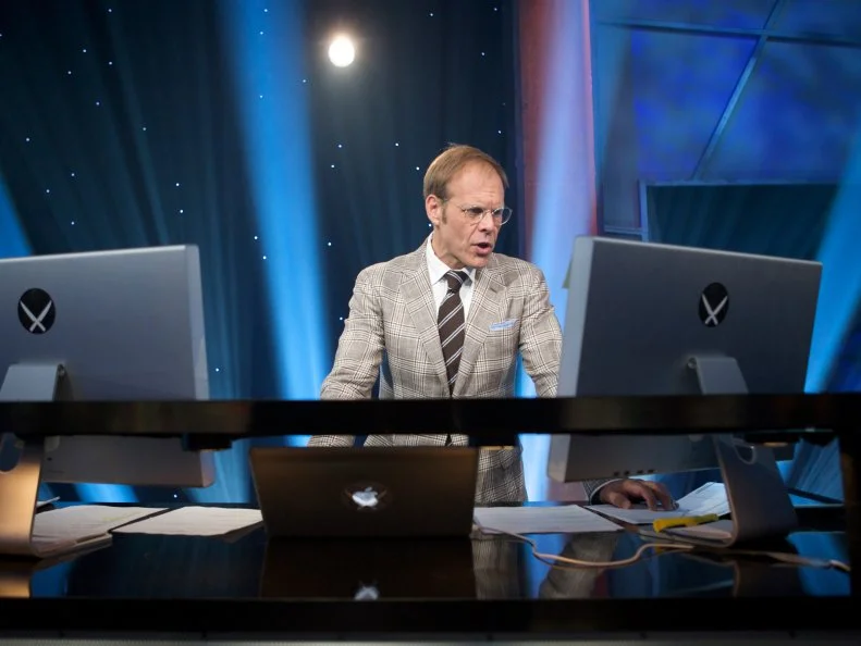 Iron Chef America - Season 10, filmed at The Food Network Studios in New York City. Secret Ingredient for Episode IA1020 is Pig.Commentator Alton Brown during Iron Chef America Battle Pig, Episode 1020, as Seen on Food Networkâ  s Iron Chef America - Season 10