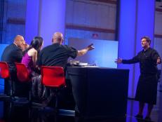 Rival-Chef Chuck Hughes facing Judge Iron Chef Michael Symon, Judge Judy Joo and Judge Simon Majumdar at Judgement for the Chairman's Challenge "Movie Snacks" in Episode 3 as seen on Food Network Next Iron Chef Season 4.