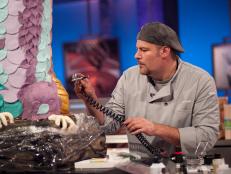 Competitor Jorg Amsler prepares his "monster cake" as seen on Food Network's Last Cake Standing.