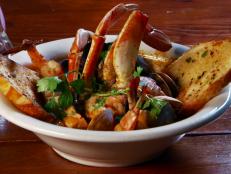 <p>Everything at Putah Creek Cafe is made fresh, right down to the homemade sausage and killer gravy. But the top-notch cioppino made with crab and shrimp had to be Guy's favorite. Want something just as impressive? How about a dynamite herb chicken pizza made from the trailer-towed pizza oven outside?</p>