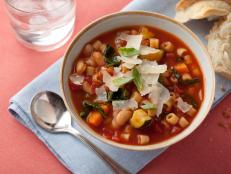 For a taste of home-stewed comfort, ladle up a bowl of Robin Miller's loaded Minestrone Soup with Pasta, Beans and Vegetables from Food Network.