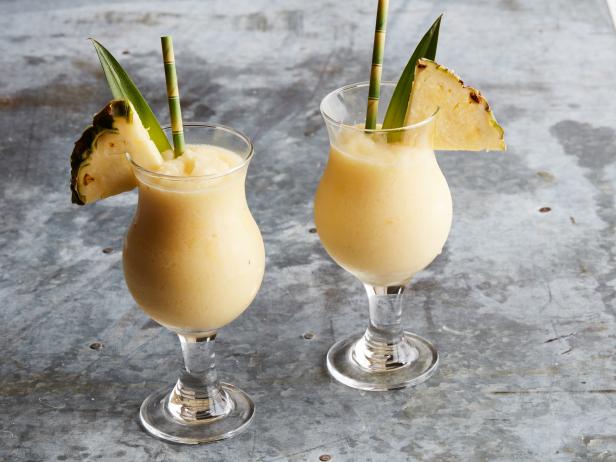 Diced Pineapple, Pineapple Juice, Coco Lopez Coconut Cream, White Rum, Dark Rum.