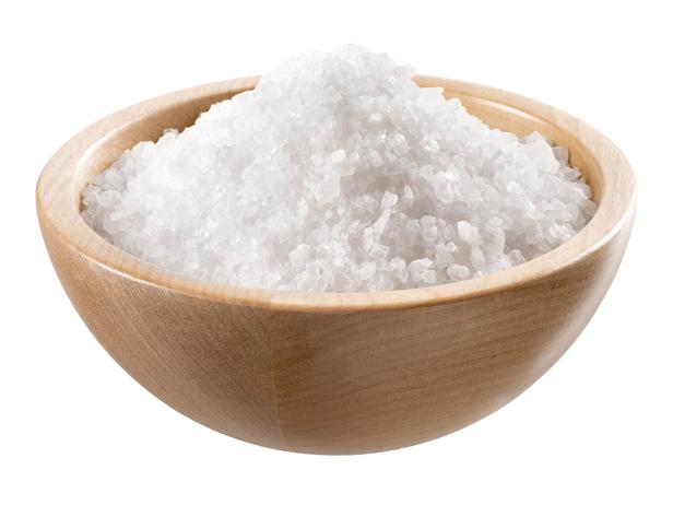 Sea salt in a  wooden bowl 