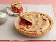 Bake Grandma's Strawberry-Rhubarb Pie recipe from Food Network. This buttery homemade crust and tangy-sweet filling is the ultimate taste of home.