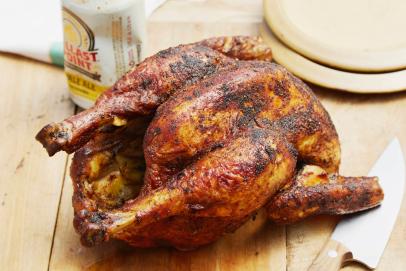 https://food.fnr.sndimg.com/content/dam/images/food/fullset/2011/5/12/1/Bobby-Flay_Beer-Can-Chicken_s4x3.jpg.rend.hgtvcom.406.271.suffix/1397572952100.jpeg