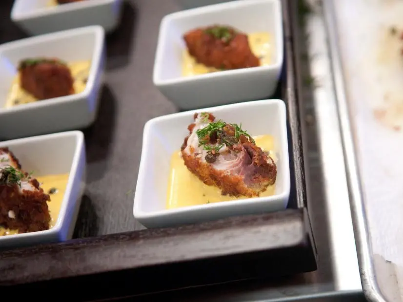 FNS7 Episode 4 Finalist Penny Davidi's "Townhouse Flat Bread Crisps" Dish Beauty for Kellogg's Camera Challenge.  Ingredients:  Town House Flat-Bread Crisps crusted mahi mahi on a curry aoili topped with fried capers and chopped dill.