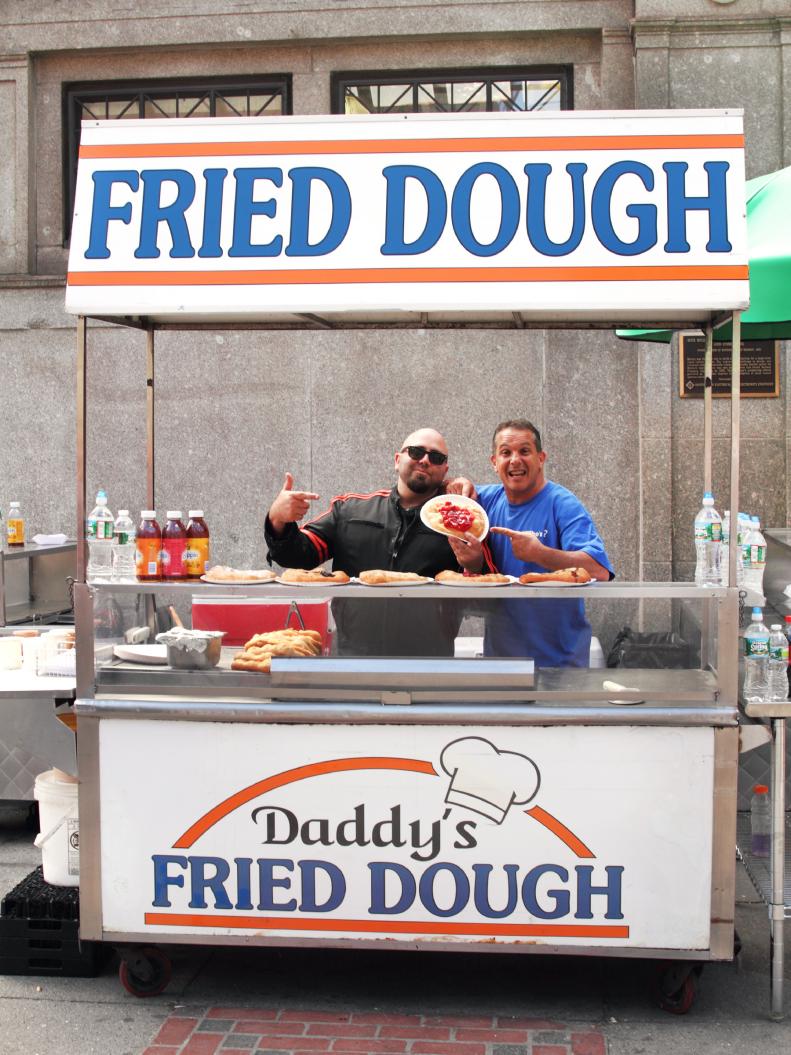 Duff Goldman meets with Ron Valeri at Daddy's Fried Dough stand in the Boston Common and learns how to make Boston Cream Fried Dough, as well as how to meet and greet the street customers, as seen on Food Network's Sugar High, season 1.