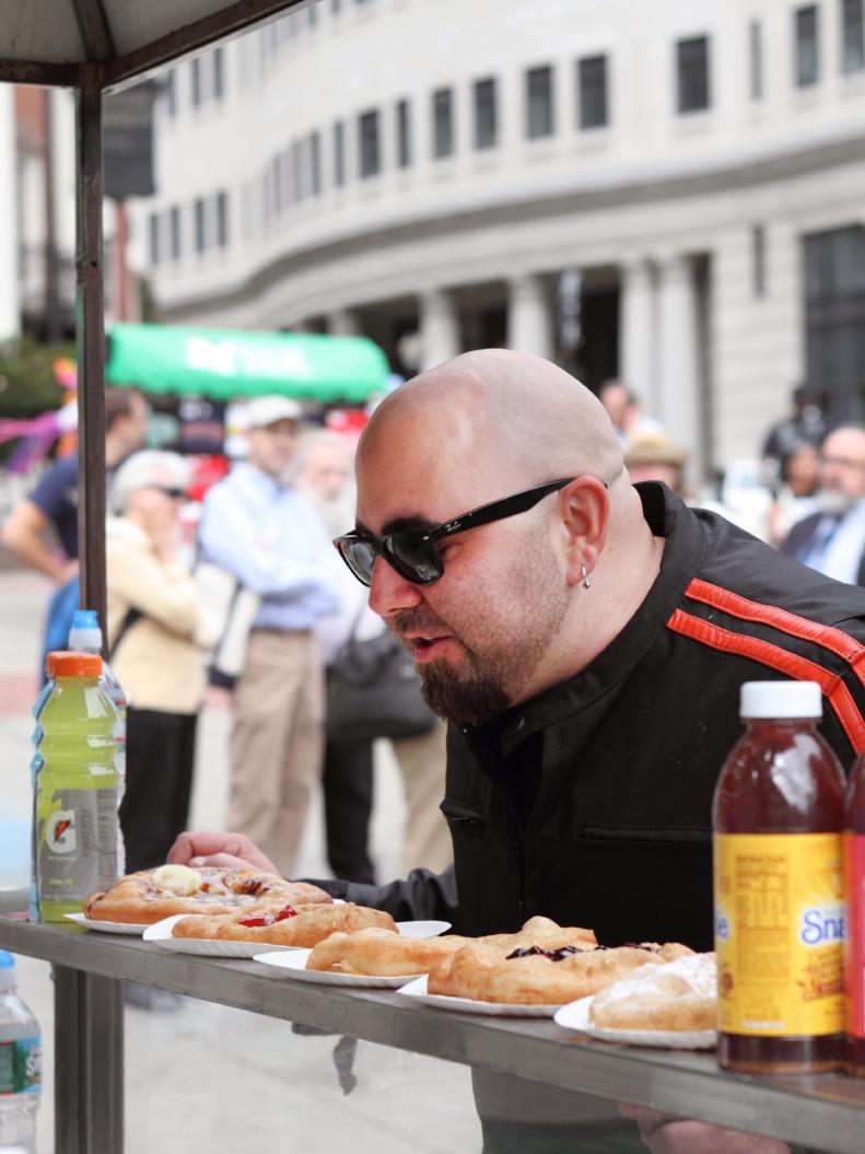 Duff Goldman, at Daddy's Fried Dough stand in the Boston Common, learns how to make Boston Cream Fried Dough, as well as how to meet and greet the street customers, as seen on Food Network's Sugar High, season 1.