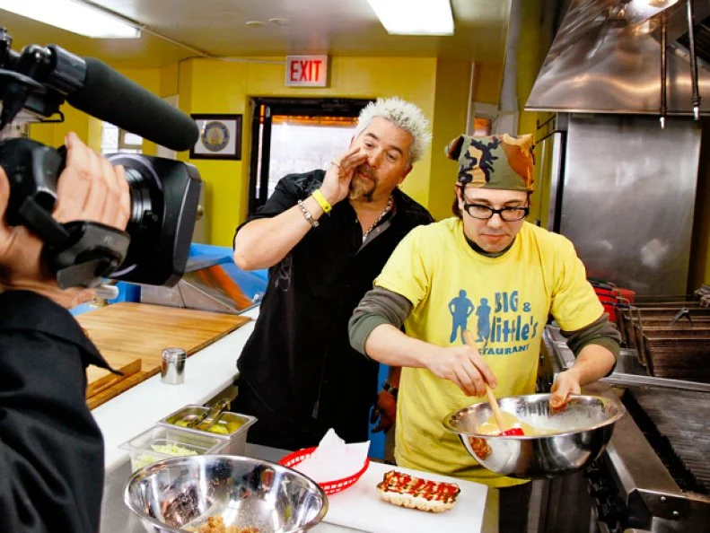 Food Network star  Guy Fieri films his show Diners, Drive Ins and Dives at two resturants in Chicago. Big & Little resturant.