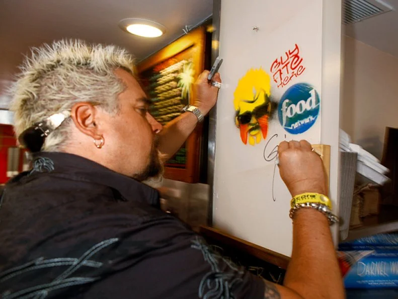 Food Network star  Guy Fieri films his show Diners, Drive Ins and Dives at two resturants in Chicago.Irazu resturant.