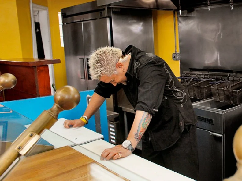 Food Network star  Guy Fieri films his show Diners, Drive Ins and Dives at two resturants in Chicago. Big & Little resturant.