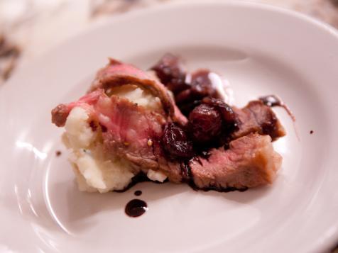 Rib Eye Steak with Roasted Grape-Red Wine Sauce and Creamy Parsnips and Potatoes
