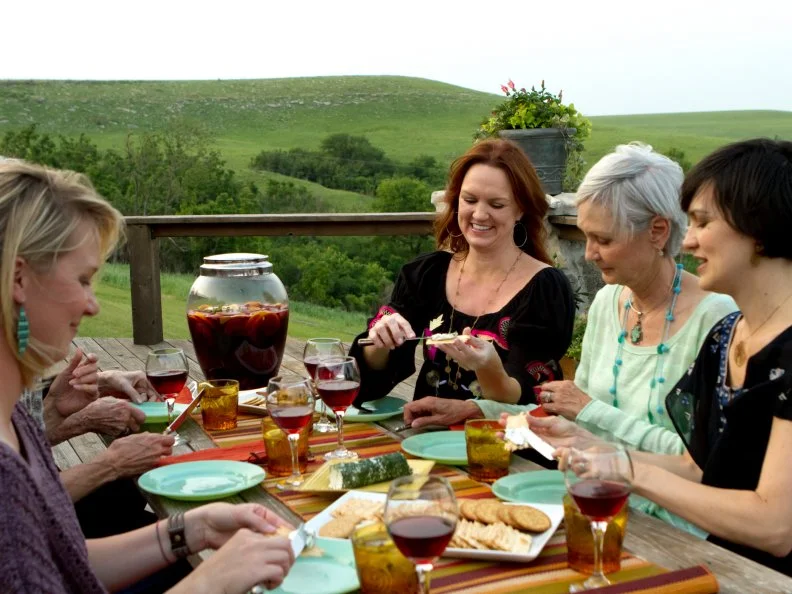 1Ree Drummond - host, and Ladd Drummond  practice roping a fake calf with the kids after having dinner at the Rancher's Dinner during episode 6 as seen on Food Network's Pioneer Woman Season 1. 