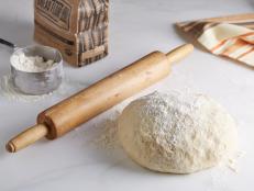 For your next pizza night at home, make Bobby Flay's homemade Pizza Dough recipe from Food Network, and finish it with your favorite toppings.