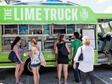 Customers await their turn to order food from the Lime Truck in North Miami, as seen on Food Network's The Great Food Truck Race.