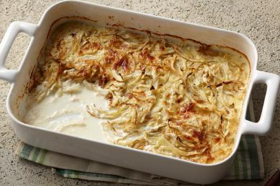 https://food.fnr.sndimg.com/content/dam/images/food/fullset/2011/8/16/0/entwine_fennel-gratin-parmesan-02_s4x3.jpg.rend.hgtvcom.406.271.suffix/1385491253085.jpeg