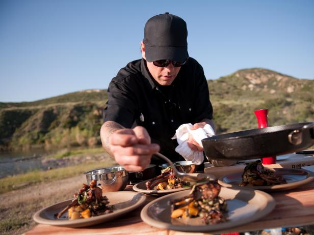 Rival-Chef Chuck Hughes plating in Episode 1 Chairman's Challenge "Heat and Meat" as seen on Food Network Next Iron Chef Season 4.