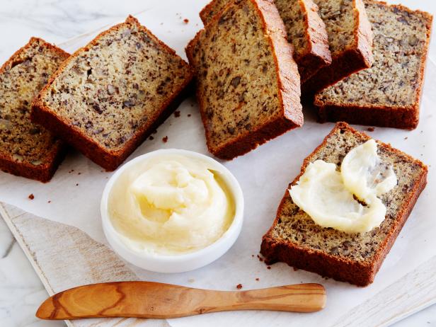 MOMMA CALLIE’S BANANA NUT BREAD WITH HONEY BUTTER, Patrick and Gina Neely,
Down Home with The Neely’s/Sleepin’ In, Food Network, Baking Soda, Baking Powder,
All-­purpose Flour, Bananas, Granulated Sugar, Eggs, Sour Cream, Vanilla Extract, Pecans