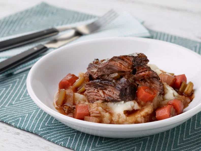 Chef Name: Ina GartenFull Recipe Name: Beef Short RibsTalent Recipe: Ina Gartenâ  s Beef Short Ribs, as seen on Barefoot ContessaFNK Recipe: Project: Foodnetwork.com, WINTER RECIPES/COCKTAILS/FNK VIDEOSShow Name: Barefoot ContessaFood Network / Cooking Channel: Food Network