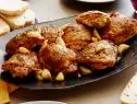 ROASTED GARLIC CLOVE CHICKEN
Melissa d’Arabian
Ten Dollar Dinners/Chic Chicken Dinner
Food Network
Chicken Thighs, Kosher Salt, Pepper, Garlic, Olive Oil, Butter, Herbes de Provence, Flour,
Chicken Stock, Lemon, Bread