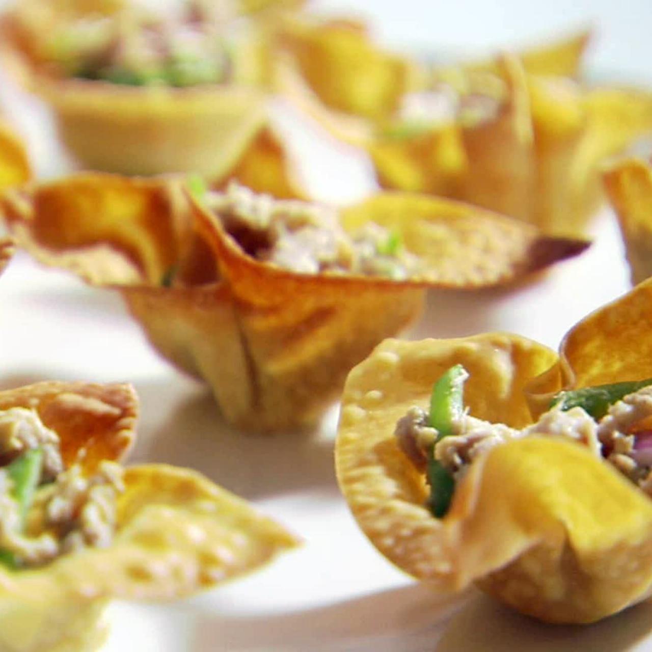 https://food.fnr.sndimg.com/content/dam/images/food/fullset/2012/1/26/0/SM0404H_crispy-wonton-cups-with-tuna-salad_s4x3.jpg.rend.hgtvcom.1280.1280.suffix/1371603118626.jpeg