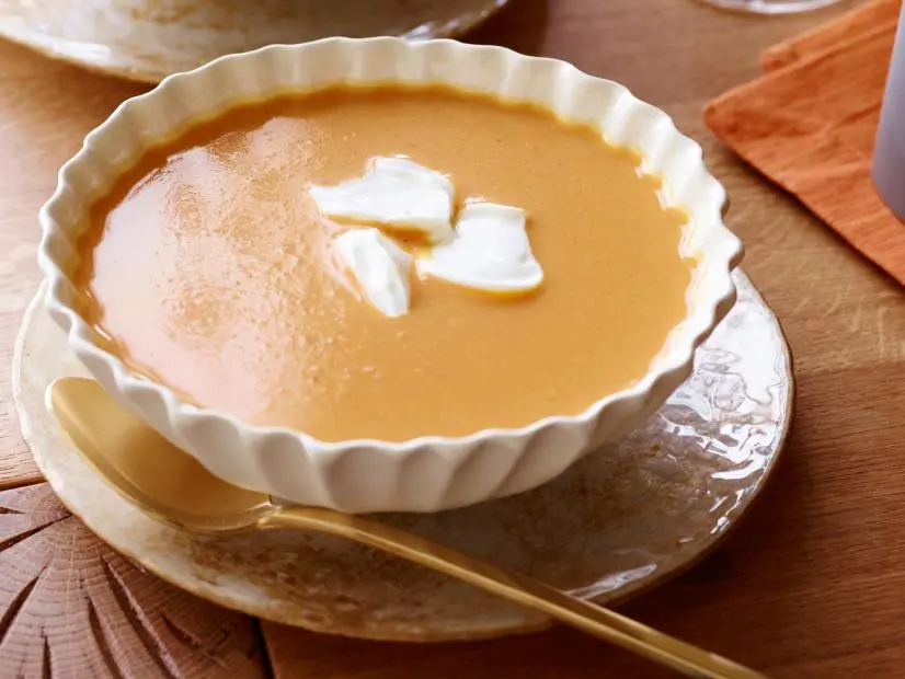 SWEET POTATO BISQUE
Patrick and Gina Neely
Down Home With The Neely’s/Food Memories
Food Network
Butter, Garlic, Vidalia Onions, Ginger, Kosher Salt, Pepper, Chipotle Pepper (canned in adobo
sauce), Chicken Broth, Apple Cider, Sweet Potatoes, Heavy Whipping Cream, Sour Cream