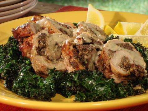 Stuffed Pork Tenderloin Over Grilled Kale Drizzled with Grilled Peach Whiskey Beurre Blanc