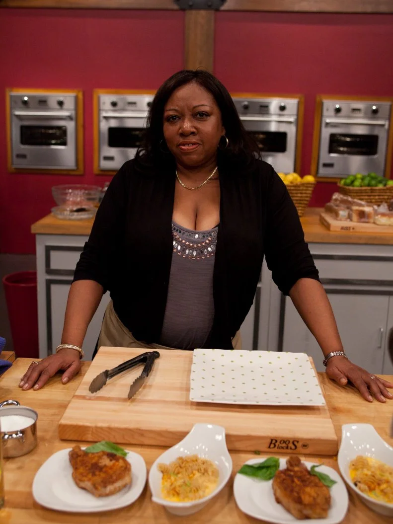 Recruit SHERRILL MOSS-?SOLOMON prepares her “Mac and Cheese and Pork Chop” for the "Show Us Your Stuff"  challenge, as seen on Food Network's Worst Cooks in America, Season 3.