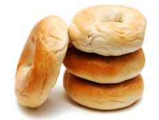 stack of bagels isolated against white