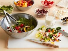 Set up a family-friendly salad bar for Meatless Monday dinner with this five-star recipe for a New York-Style Chopped Salad from Food Network's Ree Drummod.