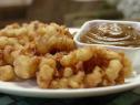 Sunny Anderson's apple fritters with peanut butter caramel sauce recipe.