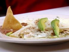 <p>Owner Luis Garcia and his mother are cooking up authentic bites from Puebla, Mexico, their hometown. Nothing here comes from a can including the tomatillo sauce for the chilaquiles verdes with chicken, which Guy absolutely adored.</p>