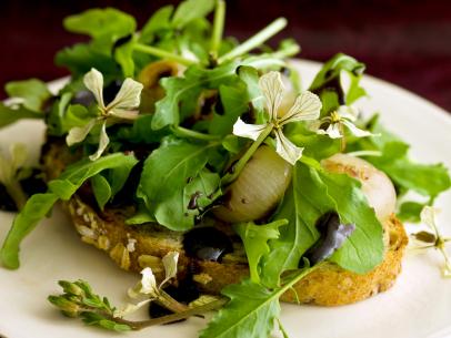 Butter-Braised Cipollini Onions with Arugula and Balsamic Syrup on Multi-grain Toast