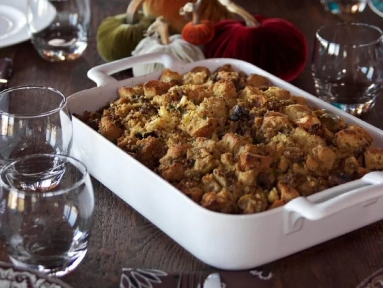 Thanksgiving dining table place settings with plated Cornbread Dressing; as seen on Food Network's The Pioneer Woman.