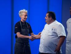 Rival Chef Amanda Freitag hugs fellow safe Rival Chef Elizabeth Falkner after the  for the  "White Bread" as seen on Food Network's Season 5.