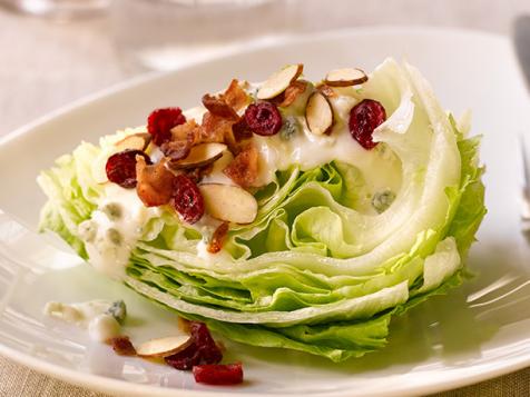 Wedge Salad with Blue Cheese, Cranberry Almonds, and Bacon