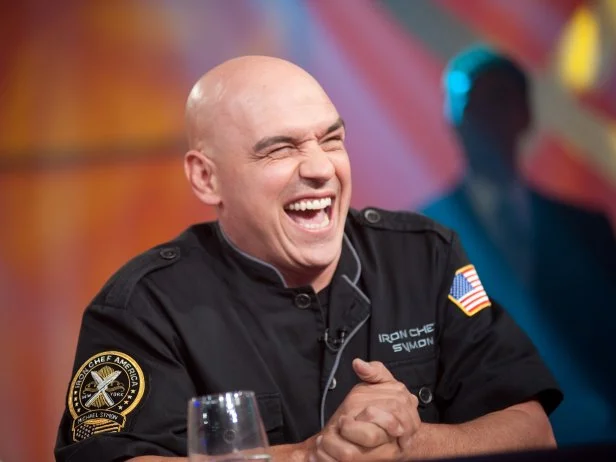 Guest Judge Iron Chef Michael Symon in for the head-to-head battle between Rival Chef Alex Guarnaschelli and Amanda Freitag in the "Heritage" as seen on Food Network’s Season 5.