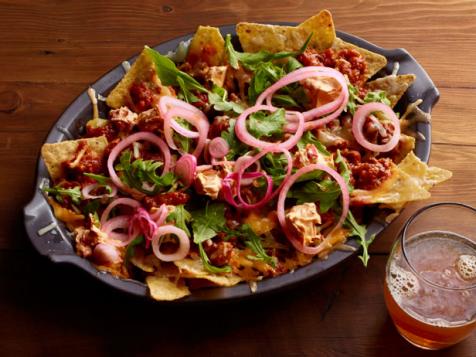 Spicy Sausage Ragu Nachos With Pickled Onions